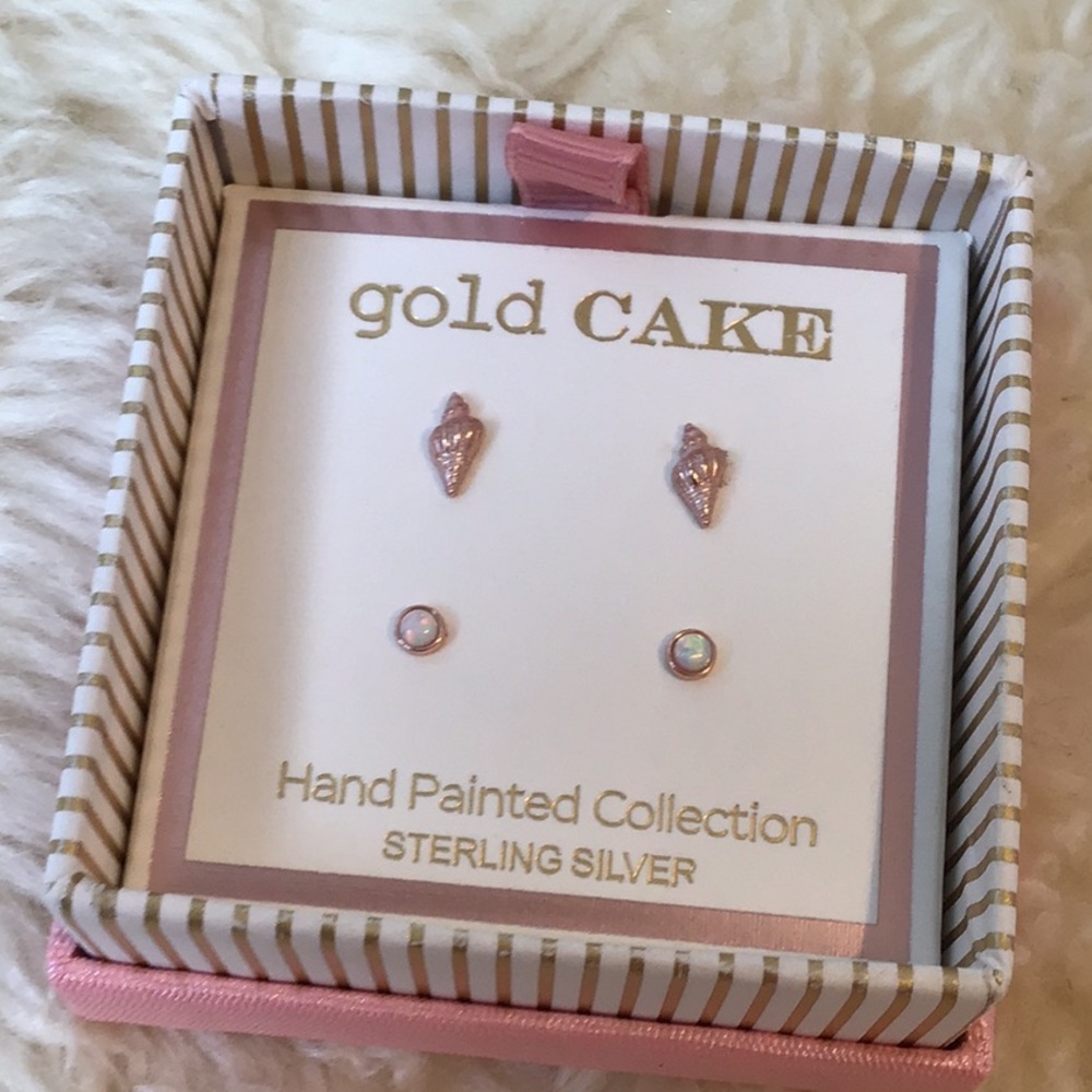 Two pair of tiny sterling silver earrings.
